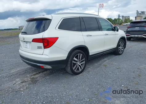 2016 Honda Pilot Touring z USA, uszkodzony, nr VIN 5FNYF6H98GB068274